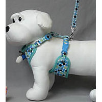 Dog mannequin showing the side of the ActiveGo Polka Dot Harness and Leash Set.