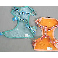 Showing the insides of the blue and peach ActiveGo Polka Dog Harness and Leash Sets.