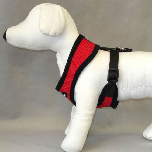 A white dog mannequin showing the Breathe EZ Dog Harness from the side.