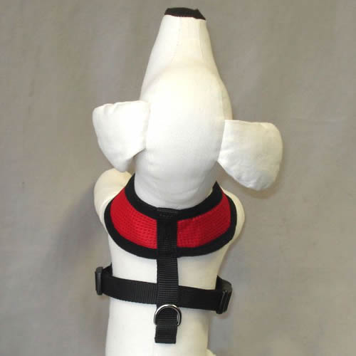 A white dog mannequin showing the Breathe EZ dog harness from the top.