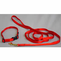 The Soft Snap Collar in red shown next to the matching leash.