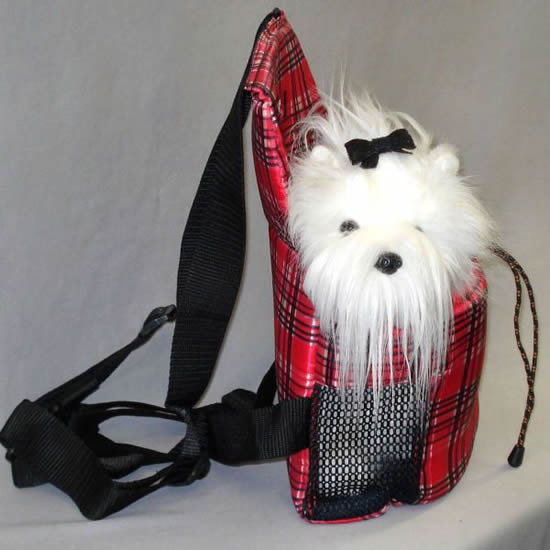 Side view of the Front Pocket Carrier with a white toy dog insite.