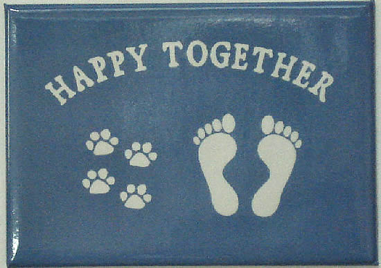 Magnet with paw prints next to footprints and saying Happy Together.