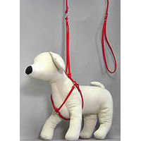 A white dog mannequin showing the front of the red Cloth Step-in Harness and Leash Set.
