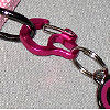 Detail of the pink Rubit I.D. Tag holder.