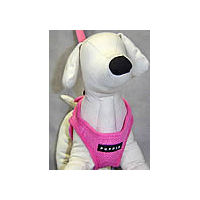 A white dog mannequin showing the front of the pink Soft Vest.