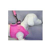 Side view of the pink Soft Vest on a white dog mannequin.
