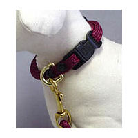 A white mannequin dog showing detail of the burgundy Rope Collar by Timberwolf, including the plastic pinch clasp and brass leash ring.