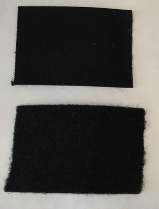 Two sides of a strip of Velcro available with the Wrap-N-Go Harness.