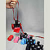 Picture of the Clean-up bag dispenser colors and rolls of bags.