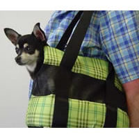 A black and white Chihuahua's head is sticking out of the Lime Green Plaid Padded Shoulder Carrier.