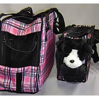 Side view of the Klassy Carrier with a stuffed dog toy demonstrating the side vent opening.