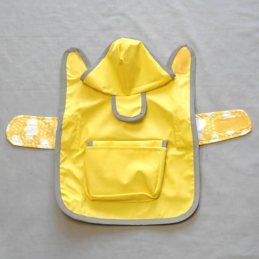 The Reversible Raincoat laid flat and open.